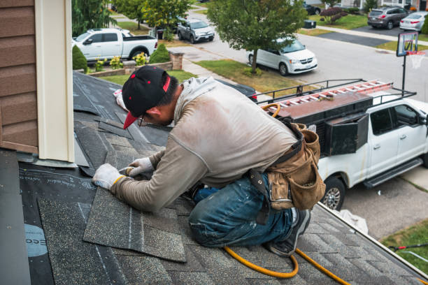 Professional Roofing technician working in Whitsett, NC